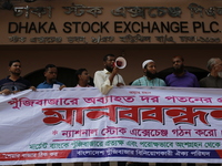 Capital market investors participate in a protest against the fall in stock prices over the past weeks in Dhaka, Bangladesh, on October 22,...