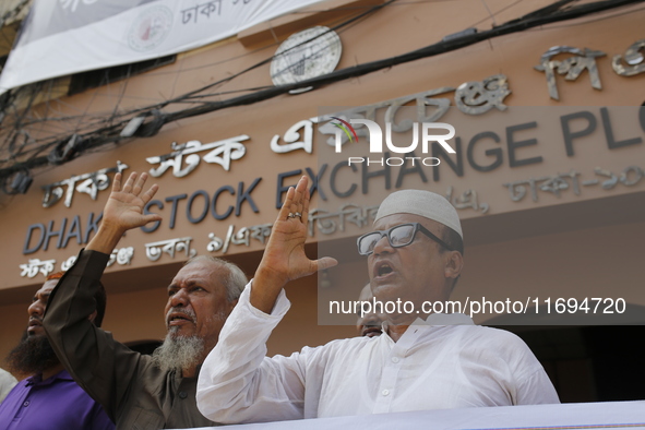 Capital market investors participate in a protest against the fall in stock prices over the past weeks in Dhaka, Bangladesh, on October 22,...