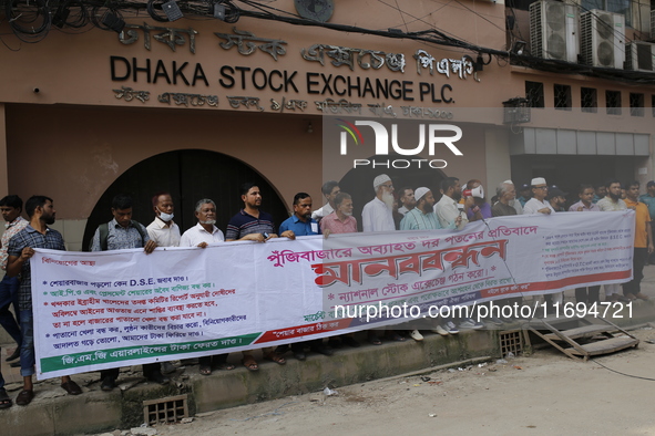 Capital market investors participate in a protest against the fall in stock prices over the past weeks in Dhaka, Bangladesh, on October 22,...