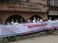 Capital market investors participate in a protest against the fall in stock prices over the past weeks in Dhaka, Bangladesh, on October 22,...