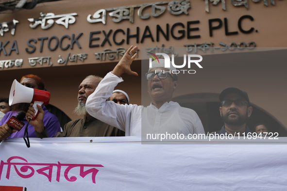 Capital market investors participate in a protest against the fall in stock prices over the past weeks in Dhaka, Bangladesh, on October 22,...