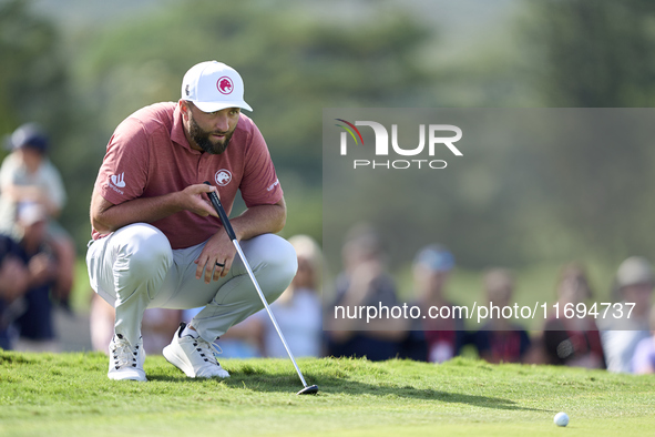 Jon Rahm of Spain studies his shot on the 18th green during day four of the Estrella Damm N.A. Andalucia Masters 2024 at Real Club de Golf S...