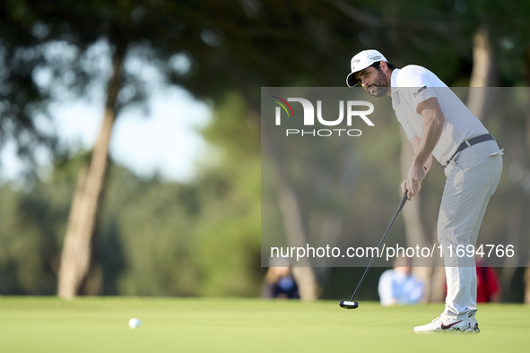 Adrian Otaegui of Spain plays a shot on the 1st green during day four of the Estrella Damm N.A. Andalucia Masters 2024 at Real Club de Golf...