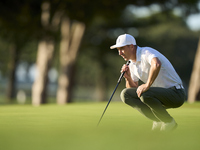 Ross Fisher of England studies his shot on the 1st green during day four of the Estrella Damm N.A. Andalucia Masters 2024 at Real Club de Go...