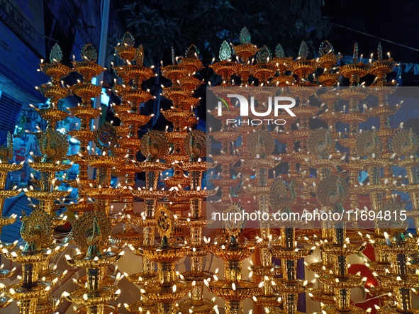 People buy decorative items ahead of the Diwali festival at Chandi Chowk Bazar in Kolkata, India, on October 22, 2024. 