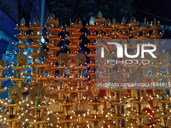 People buy decorative items ahead of the Diwali festival at Chandi Chowk Bazar in Kolkata, India, on October 22, 2024. (