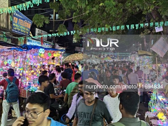 People buy decorative items ahead of the Diwali festival at Chandi Chowk Bazar in Kolkata, India, on October 22, 2024. 