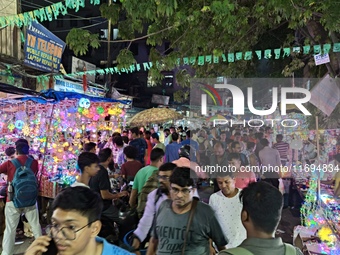 People buy decorative items ahead of the Diwali festival at Chandi Chowk Bazar in Kolkata, India, on October 22, 2024. (