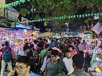 People buy decorative items ahead of the Diwali festival at Chandi Chowk Bazar in Kolkata, India, on October 22, 2024. (