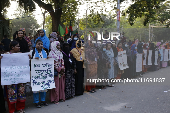 Women take part in a protest against the torture of a domestic worker as they demand justice for assaults on women in Dhaka, Bangladesh, on...