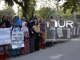 Women take part in a protest against the torture of a domestic worker as they demand justice for assaults on women in Dhaka, Bangladesh, on...