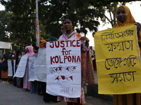 Women take part in a protest against the torture of a domestic worker as they demand justice for assaults on women in Dhaka, Bangladesh, on...