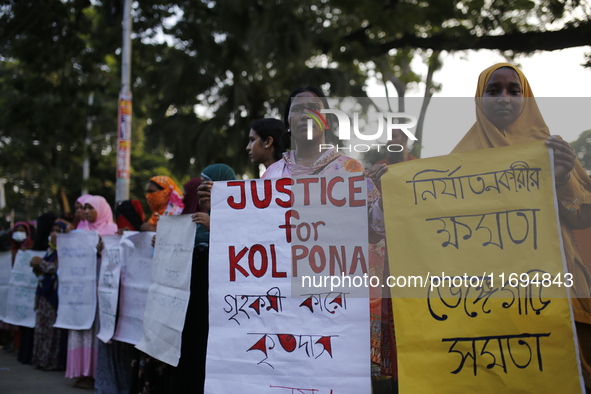 Women take part in a protest against the torture of a domestic worker as they demand justice for assaults on women in Dhaka, Bangladesh, on...