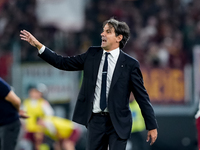 Simone Inzaghi head coach of FC Internazionale yells during the Serie A Enilive match between AS Roma and FC Internazionale at Stadio Olimpi...