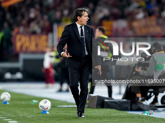 Simone Inzaghi head coach of FC Internazionale yells during the Serie A Enilive match between AS Roma and FC Internazionale at Stadio Olimpi...