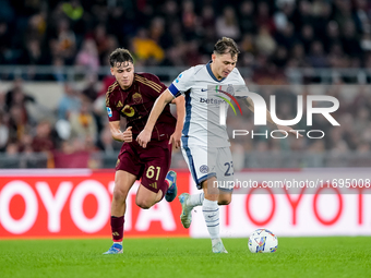 Nicolo' Barella of FC Internazionale and Niccolo' Pisilli of AS Roma compete for the ball during the Serie A Enilive match between AS Roma a...