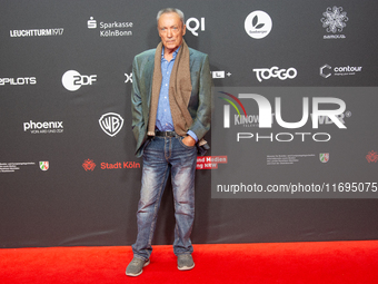 Udo Kier, a German actor, is seen on the red carpet during the photocall of ''Swan Song'' at Film Palast in Cologne, Germany, on October 22,...