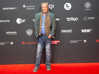 Udo Kier, a German actor, is seen on the red carpet during the photocall of ''Swan Song'' at Film Palast in Cologne, Germany, on October 22,...