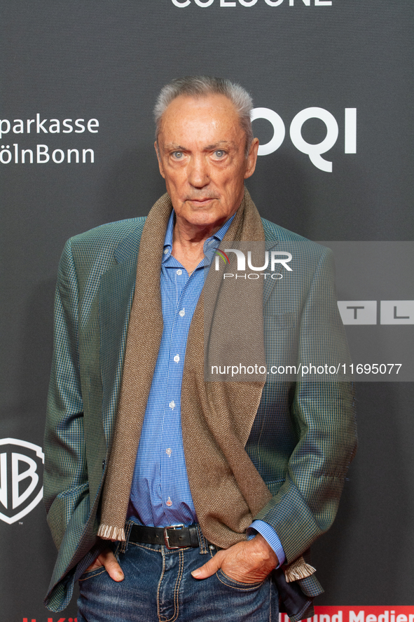 Udo Kier, a German actor, is seen on the red carpet during the photocall of ''Swan Song'' at Film Palast in Cologne, Germany, on October 22,...