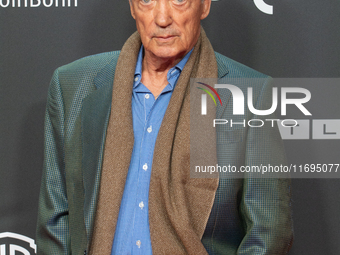 Udo Kier, a German actor, is seen on the red carpet during the photocall of ''Swan Song'' at Film Palast in Cologne, Germany, on October 22,...