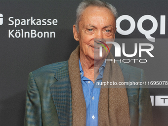 Udo Kier, a German actor, is seen on the red carpet during the photocall of ''Swan Song'' at Film Palast in Cologne, Germany, on October 22,...