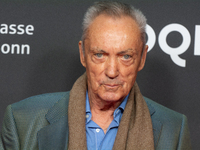 Udo Kier, a German actor, is seen on the red carpet during the photocall of ''Swan Song'' at Film Palast in Cologne, Germany, on October 22,...