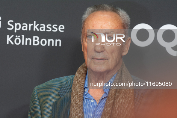 Udo Kier, a German actor, is seen on the red carpet during the photocall of ''Swan Song'' at Film Palast in Cologne, Germany, on October 22,...