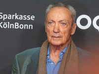 Udo Kier, a German actor, is seen on the red carpet during the photocall of ''Swan Song'' at Film Palast in Cologne, Germany, on October 22,...