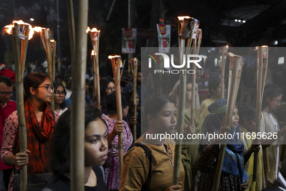 Students and activists take part in a torch procession protest against recent child rape, demanding justice and punishment in all rape cases...