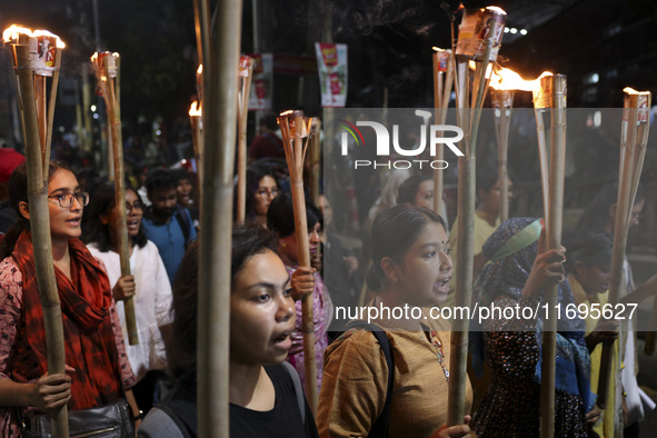 Students and activists take part in a torch procession protest against recent child rape, demanding justice and punishment in all rape cases...