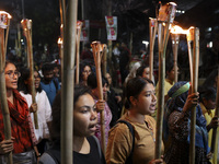 Students and activists take part in a torch procession protest against recent child rape, demanding justice and punishment in all rape cases...