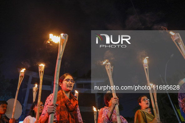 Students and activists take part in a torch procession protest against recent child rape, demanding justice and punishment in all rape cases...