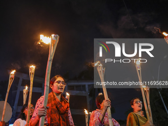 Students and activists take part in a torch procession protest against recent child rape, demanding justice and punishment in all rape cases...