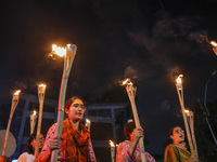 Students and activists take part in a torch procession protest against recent child rape, demanding justice and punishment in all rape cases...