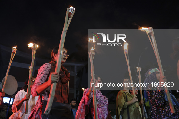 Students and activists take part in a torch procession protest against recent child rape, demanding justice and punishment in all rape cases...