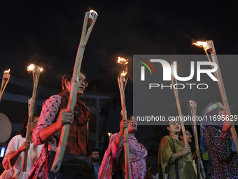 Students and activists take part in a torch procession protest against recent child rape, demanding justice and punishment in all rape cases...