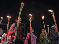 Students and activists take part in a torch procession protest against recent child rape, demanding justice and punishment in all rape cases...