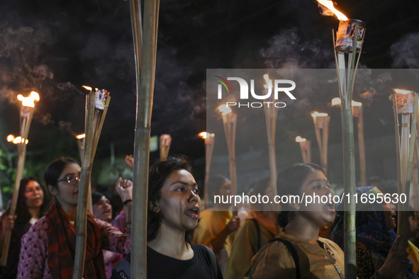 Students and activists take part in a torch procession protest against recent child rape, demanding justice and punishment in all rape cases...