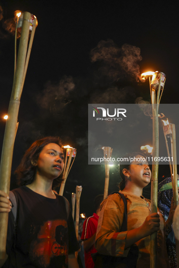 Students and activists take part in a torch procession protest against recent child rape, demanding justice and punishment in all rape cases...