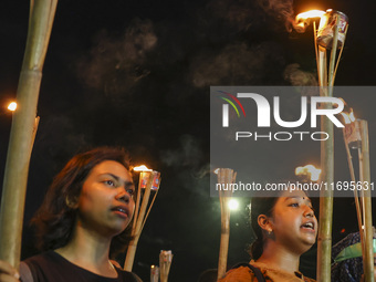 Students and activists take part in a torch procession protest against recent child rape, demanding justice and punishment in all rape cases...