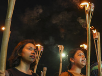 Students and activists take part in a torch procession protest against recent child rape, demanding justice and punishment in all rape cases...