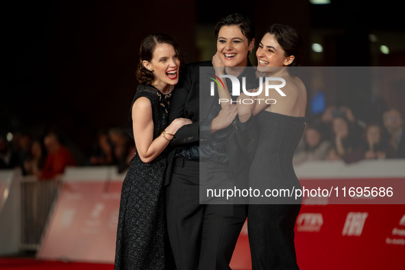 Tecla Insolia, Sara Petraglia, and Carlotta Gamba attend the ''L'Albero'' red carpet during the 19th Rome Film Festival at Auditorium Parco...