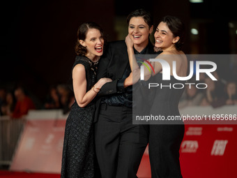 Tecla Insolia, Sara Petraglia, and Carlotta Gamba attend the ''L'Albero'' red carpet during the 19th Rome Film Festival at Auditorium Parco...