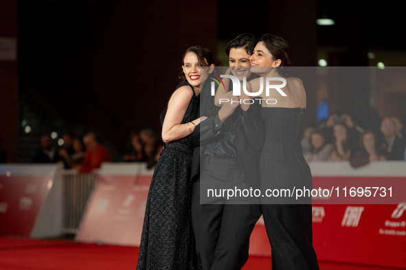 Tecla Insolia, Sara Petraglia, and Carlotta Gamba attend the ''L'Albero'' red carpet during the 19th Rome Film Festival at Auditorium Parco...