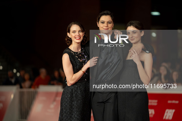 Tecla Insolia, Sara Petraglia, and Carlotta Gamba attend the ''L'Albero'' red carpet during the 19th Rome Film Festival at Auditorium Parco...