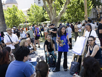 Students take a class outside the Casa Rosada presidential palace during a protest against a bill vetoed by Argentina's President Javier Mil...