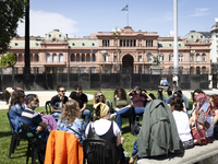 Students take a class outside the Casa Rosada presidential palace during a protest against a bill vetoed by Argentina's President Javier Mil...