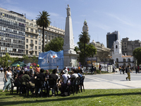 Students take a class outside the Casa Rosada presidential palace during a protest against a bill vetoed by Argentina's President Javier Mil...