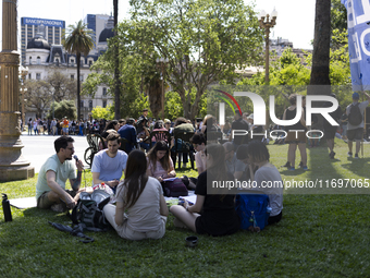 Students take a class outside the Casa Rosada presidential palace during a protest against a bill vetoed by Argentina's President Javier Mil...