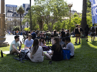 Students take a class outside the Casa Rosada presidential palace during a protest against a bill vetoed by Argentina's President Javier Mil...